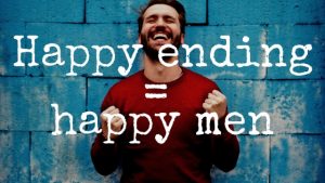 A man in a red jumper who is very happy after getting a happy ending massage